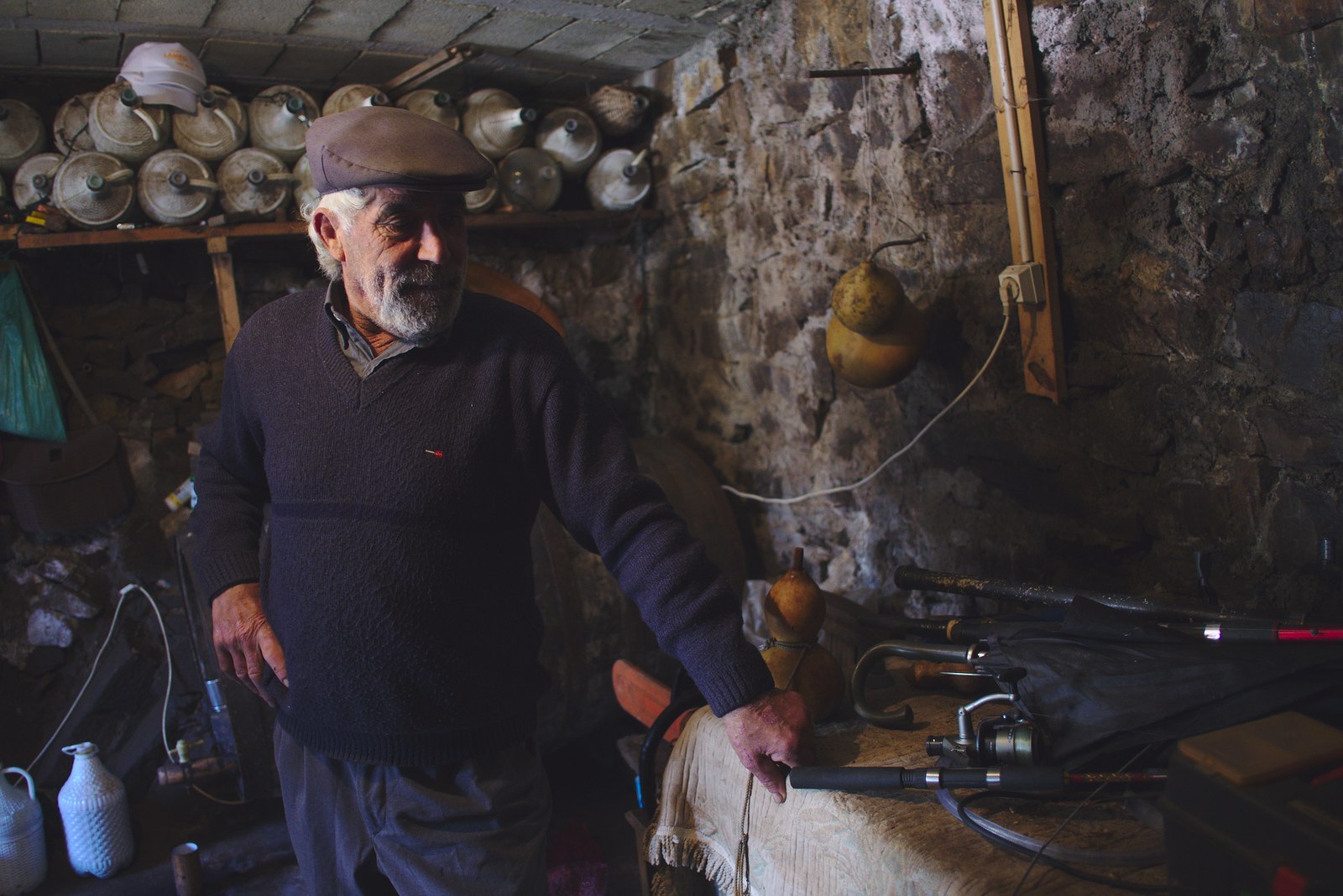 Having a glass of jeropiga inside a cellar at one of village's houses.
